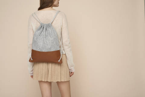 Simple leather and felt drawstring backpack